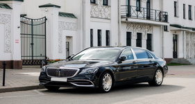 Sedan taxi to DIA airport in Evergreen, CO